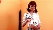 Redhead girl pulls panties aside to play with her pussy