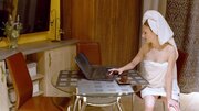 Chick gets horny watching porn and plays with her pussy