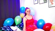 Balloon popping teaser shows her big naturals as well