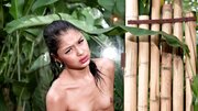 Skinny chick gets naked and masturbates in the yard