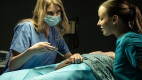 A couple of sexy chicks have a threesome with a patient
